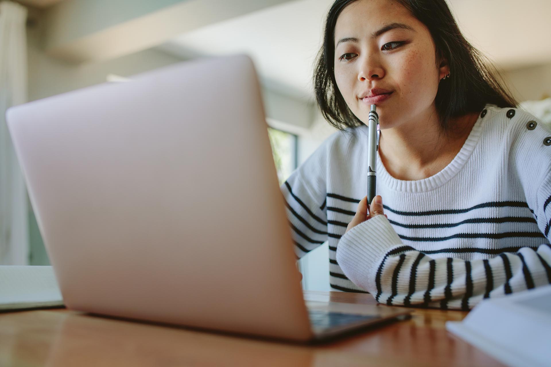 person looking at laptop