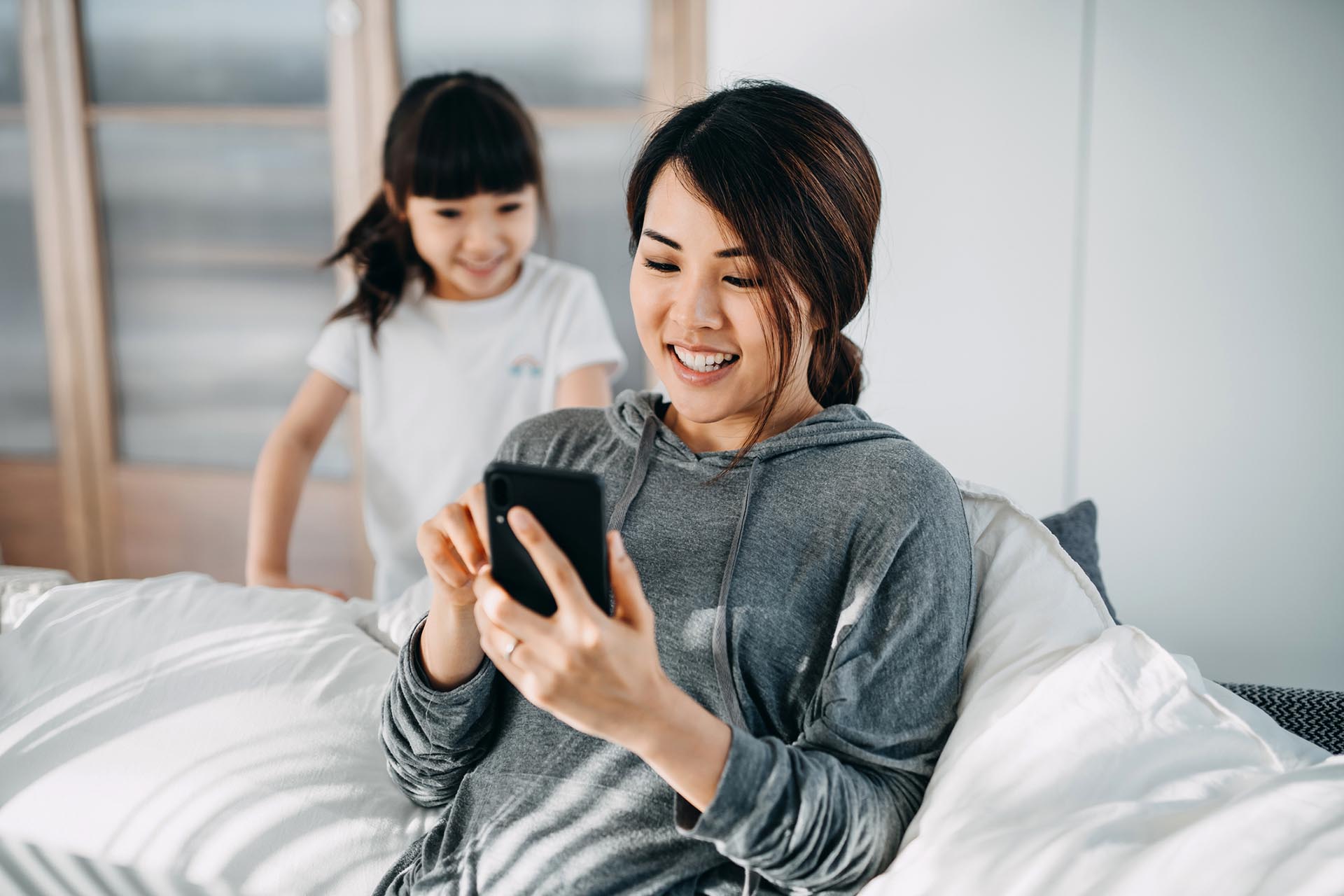 woman using her smartphone