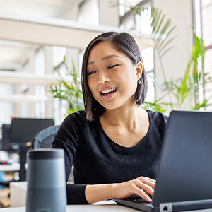 Young woman using her laptop