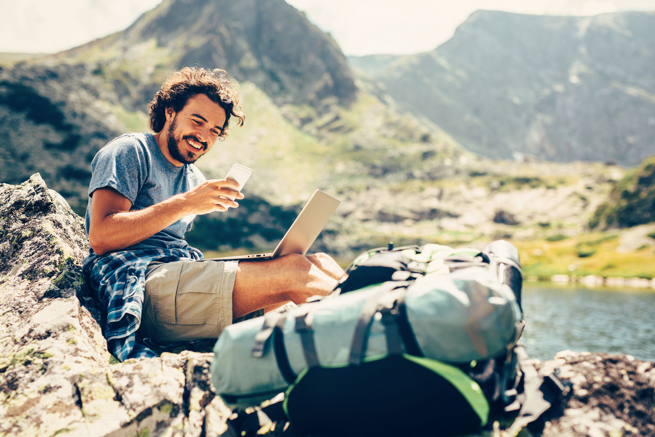 Man going over finances for purchase on his laptop