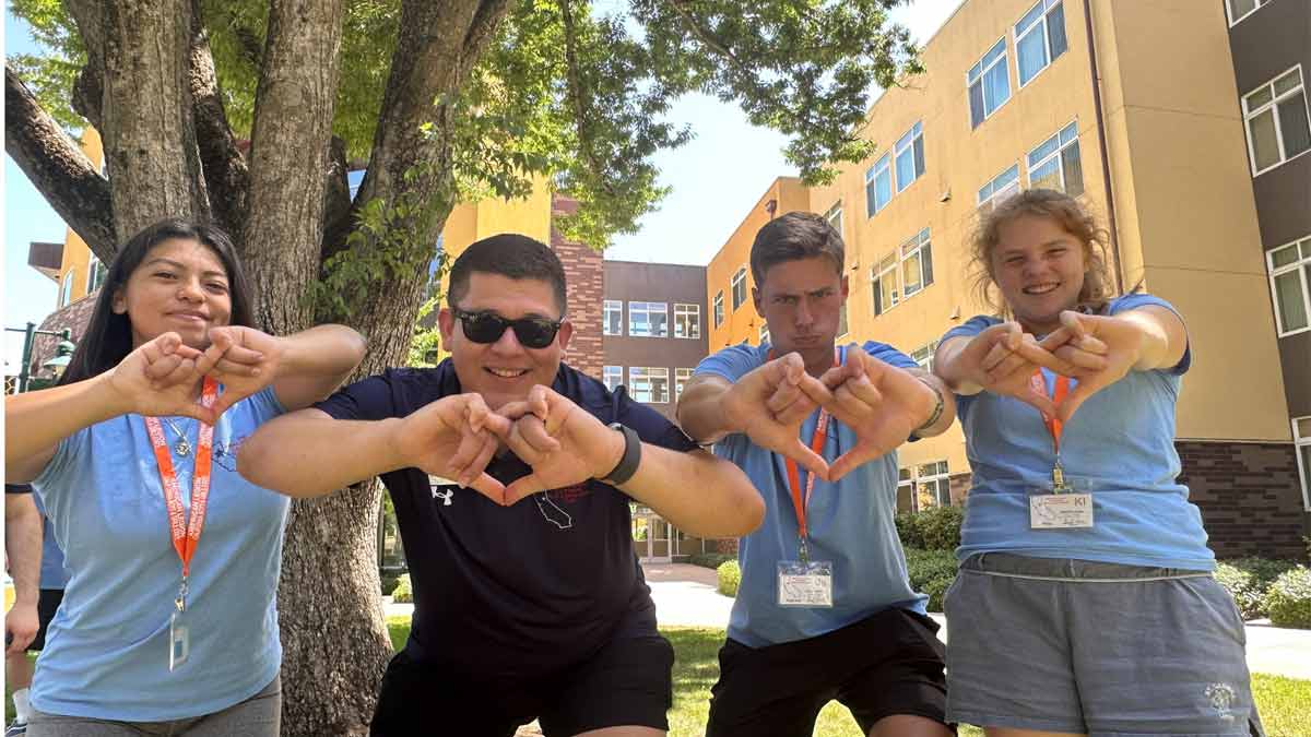 Photo of Jonathan Fisher-Espinoza with California Boys and Girls State participants this year.