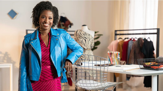 Business owner standing in her shop