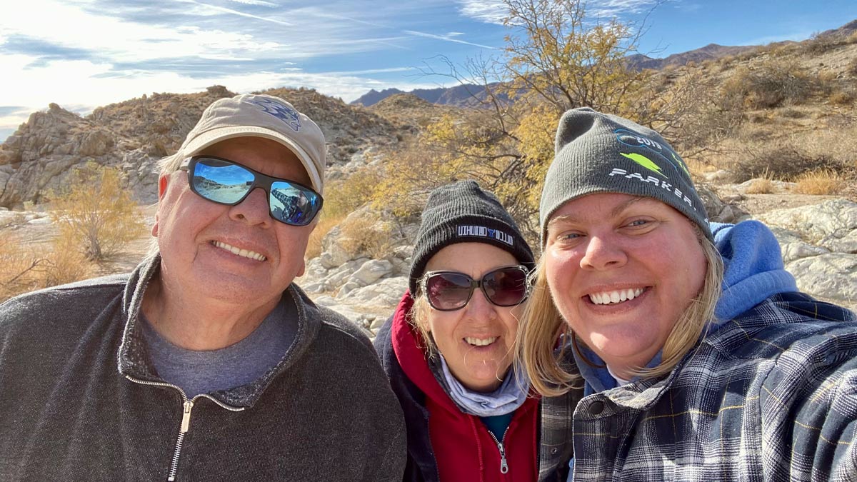 A mother, father and daughter in a selfie.