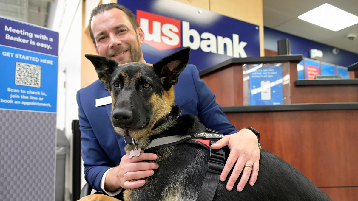 Man with German shepherd. 