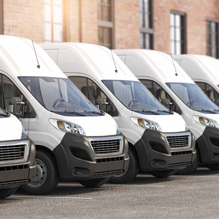 A row of fleet vans