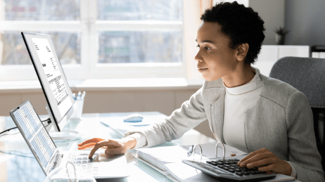 Business woman at a desk using a laptop