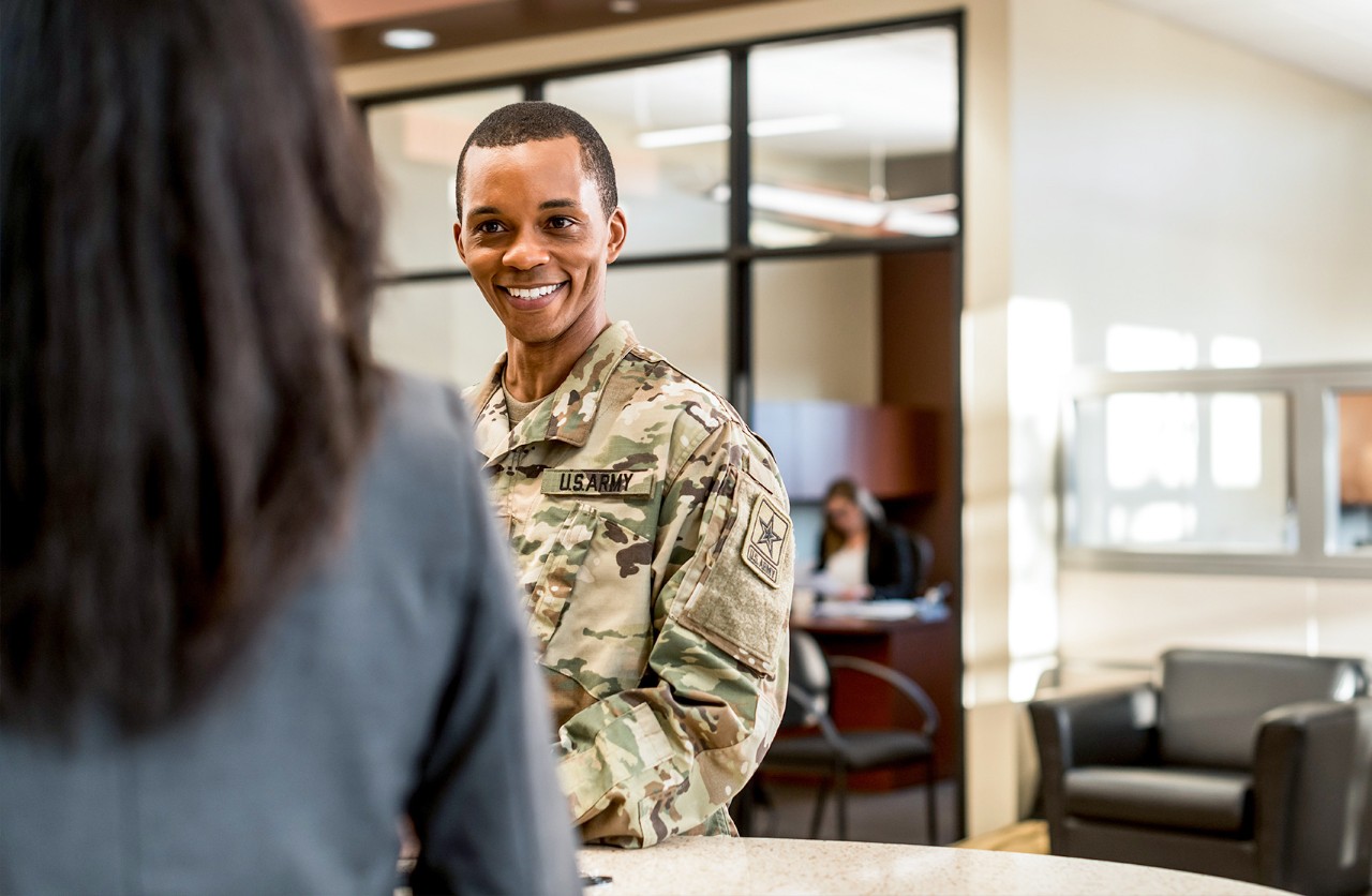Military servicemember banking inside a U.S. Bank branch