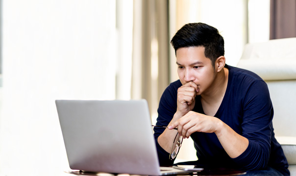 Man looking at laptop