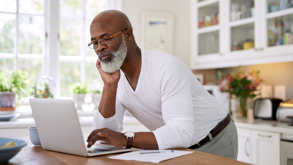 Man reading computer