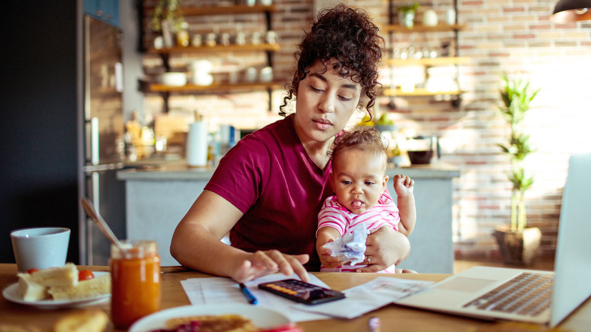 Mother working at table