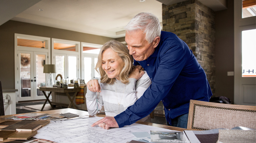 Retired couple reviewing financial plans