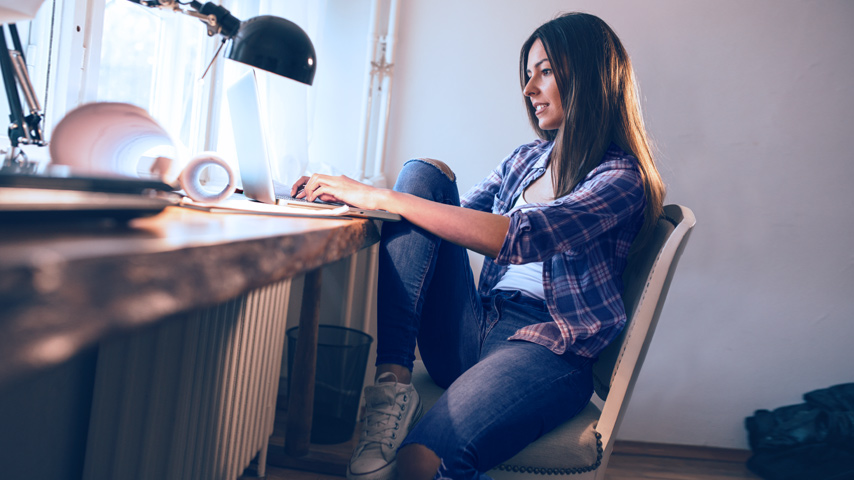 Woman working on laptop