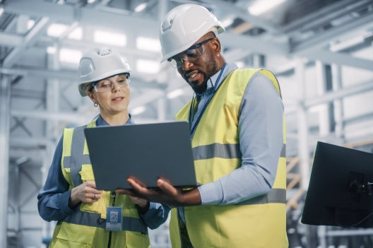 Workers reviewing documents