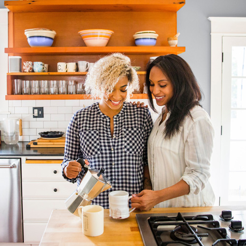 Couple enjoying coffee at home